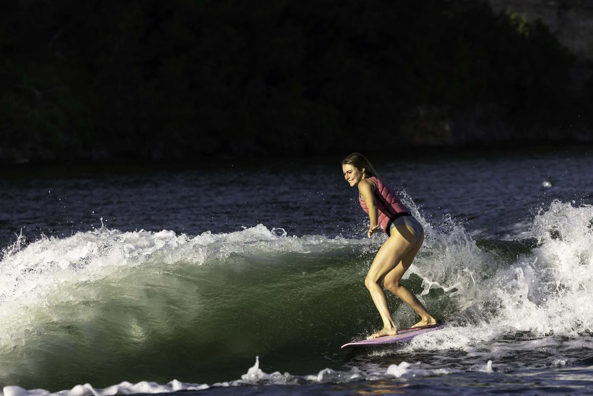 Woman wake surfing on Lake of the Ozarks
